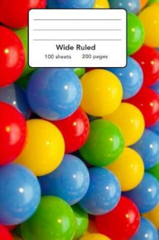 Cover of Wide Ruled Composition Notebook 6" x 9". Colorful Kids Play Balls