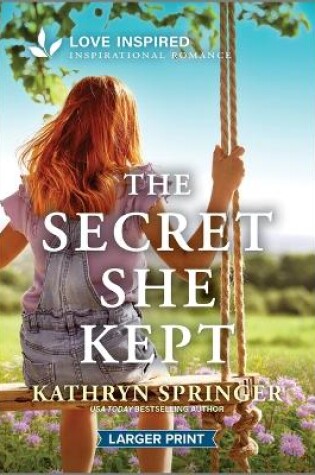 Cover of The Secret She Kept