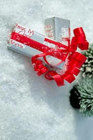 Cover of Christmas Presents in the Snow Wrapped in a Red Bow