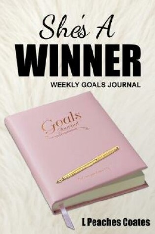 Cover of She's a Winner Weekly Goal Journal