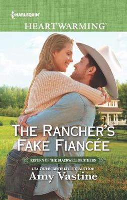 Cover of The Rancher's Fake Fiancée