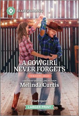 Book cover for A Cowgirl Never Forgets