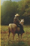 Book cover for Cute Cowboy on a Yellow Horse in the Mist Wide-ruled School Composition Lined Notebook