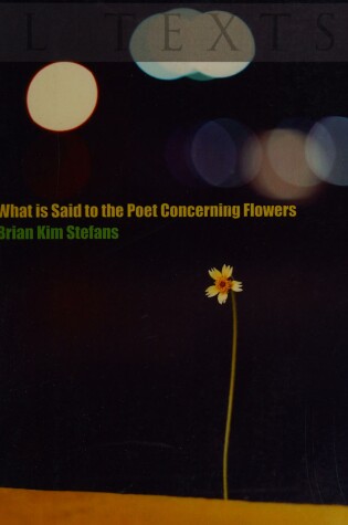 Cover of What Is Said to the Poet Concerning Flowers