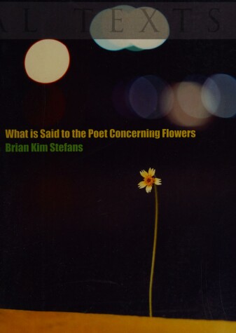 Book cover for What Is Said to the Poet Concerning Flowers