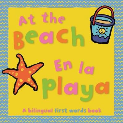 Book cover for At The Beach/En la Playa