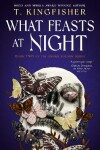 Book cover for What Feasts at Night