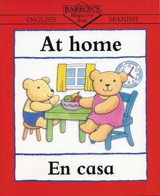 Book cover for At Home/A casa