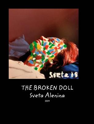 Book cover for The broken doll