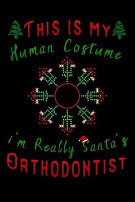 Book cover for this is my human costume im really santa's Orthodontist