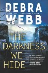 Book cover for The Darkness We Hide