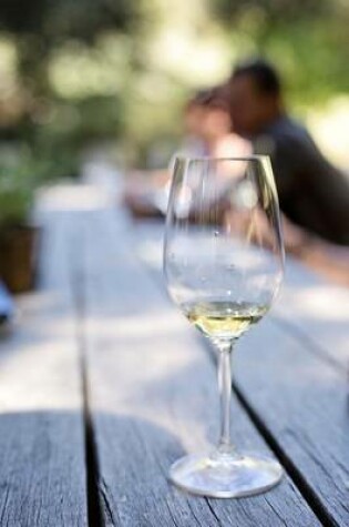 Cover of A Nice Glass of White Wine on a Picnic Table in the Fall