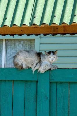 Book cover for Cat Relaxing on a Green Fence Journal