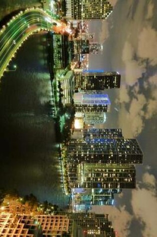 Cover of Miami, Florida Skyline Lit Up by Lights at Night