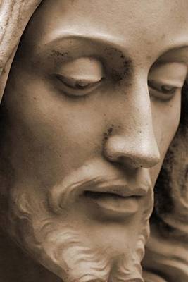 Book cover for A Close Up of a Statue of Jesus Christ