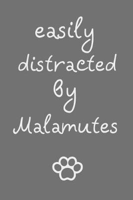 Book cover for Easily distracted by Malamutes