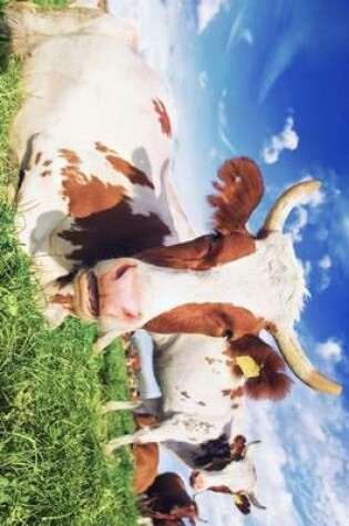 Cover of A Herd of Cows Relaxing in a Meadow