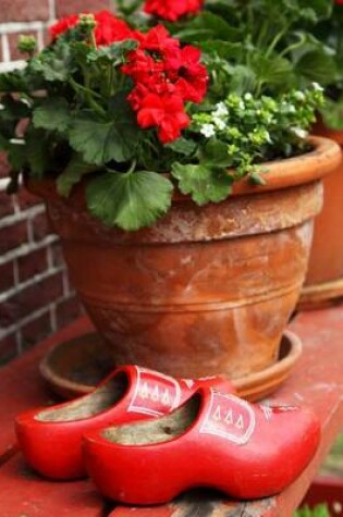 Cover of Jumbo Oversized Red Clogs and Planters on a Bench in Holland