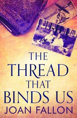 Book cover for THE THREAD THAT BINDS US