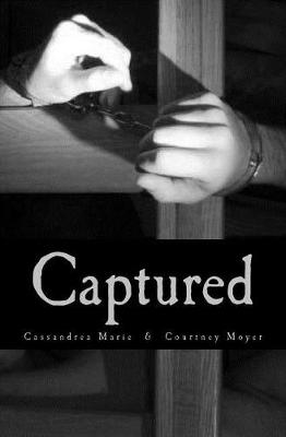 Book cover for Captured