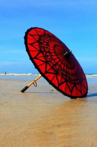 Cover of A Red and Black Umbrella on the Shore