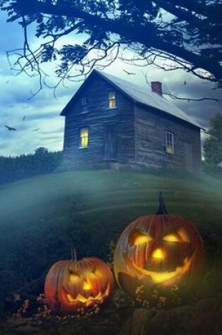 Cover of A Haunted House and a Pair of Lit Pumpkins