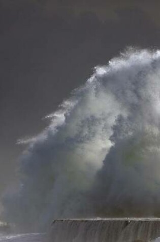 Cover of A Storm Wave Hitting a Pier in Mouth of River Ave in Vila Do Conde, Portugal