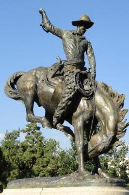 Book cover for Statue of a Cowboy on a Bucking Broncho Horse Journal