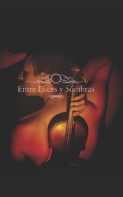 Book cover for Entre Luces y Sombras.