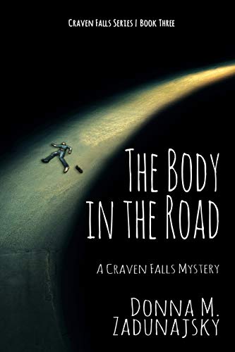 Book cover for The Body in the Road