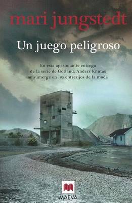 Book cover for Un Juego Peligroso