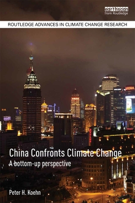 Book cover for China Confronts Climate Change