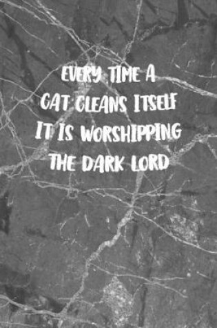 Cover of Every time A Cat Cleans Itself It Is Worshipping The Dark Lord