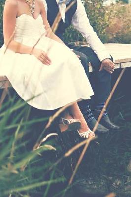 Book cover for Adorable Bride and Groom Relaxing on a Bridge Journal