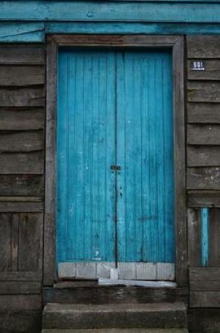 Cover of Blue Door on a Rustic Old Barn