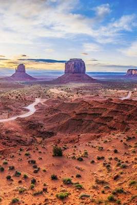 Book cover for The Sun Shining Down at Monument Valley