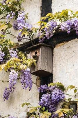 Book cover for Wisteria Tree Next to a House Journal