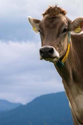 Book cover for A Cow Standing in the Alpine Mountains Journal