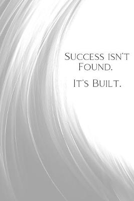 Book cover for Success Isn't Found. It's Built.