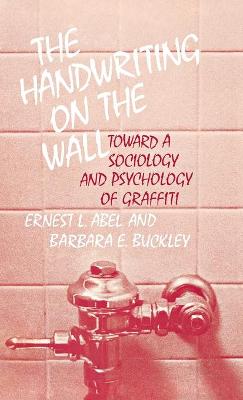 Book cover for The Handwriting on the Wall