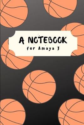 Book cover for A Basketball Themed Notebook for Amaya J.