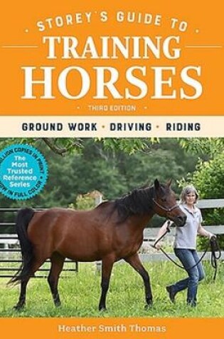 Cover of Storey's Guide to Training Horses, 3rd Edition: Ground Work, Driving, Riding