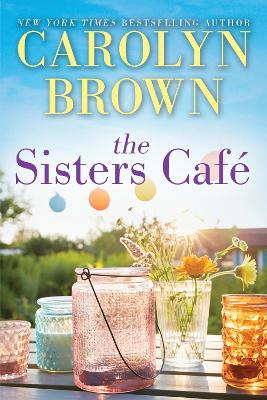 Book cover for The Sisters Café