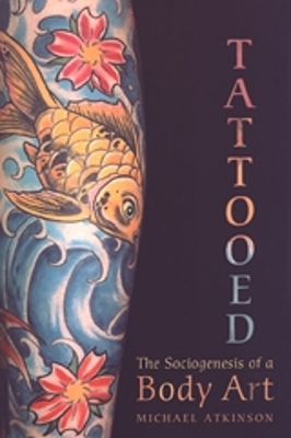 Book cover for Tattooed