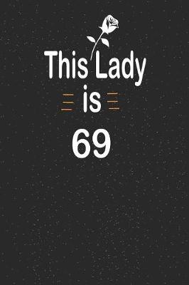 Book cover for This lady is 69