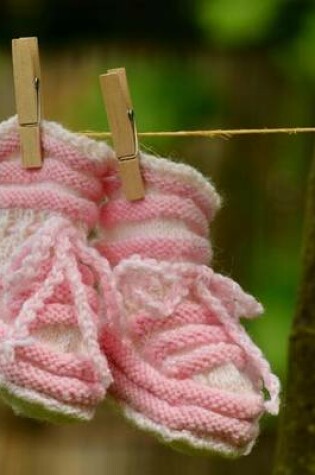 Cover of Jumbo Oversized Newborn Pink Baby Shoes on a Clothesline