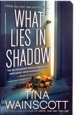 Book cover for What Lies in Shadow