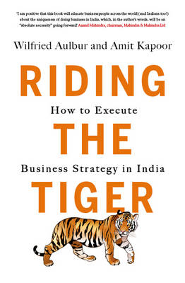 Book cover for Riding the Tiger