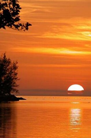 Cover of The Sun Sinking Into the Ocean in Key West, Florida