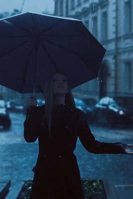 Book cover for A Woman Standing on a Street Corner in the Rain